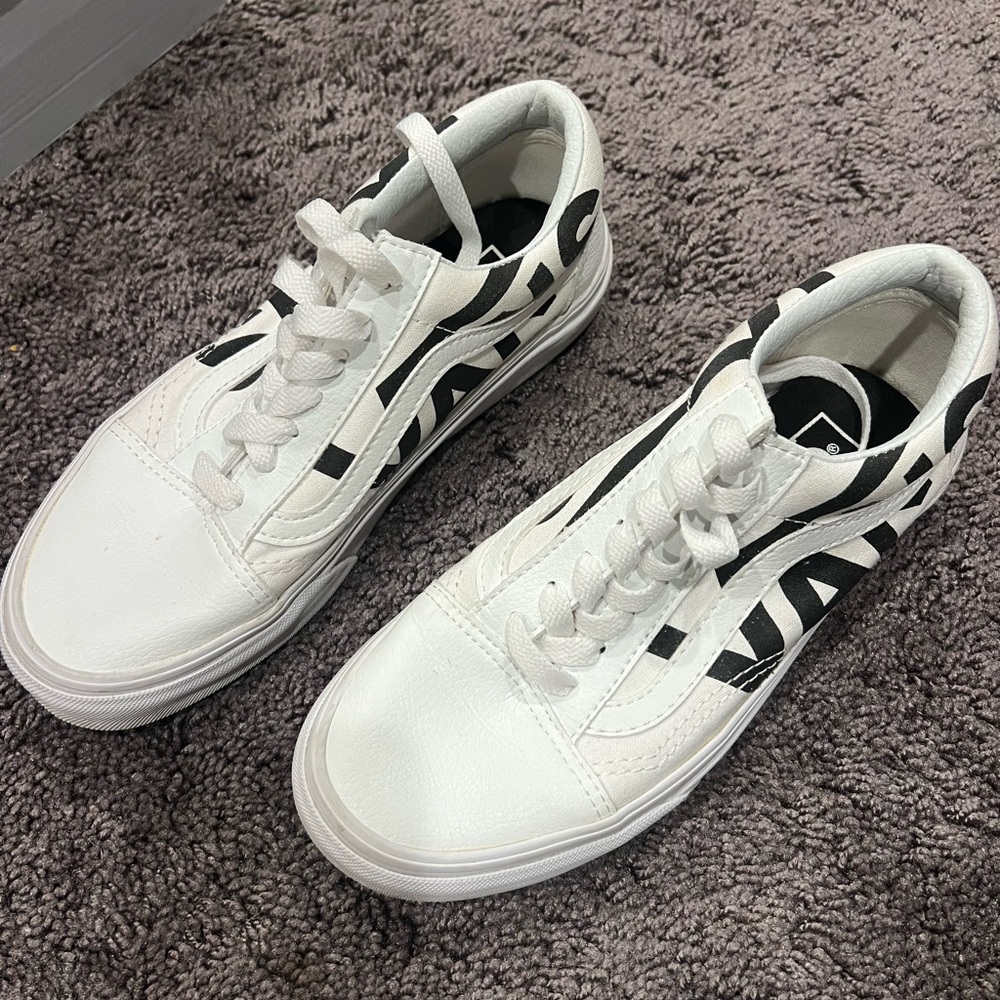 Vans White Leather Sneakers with Black Logo